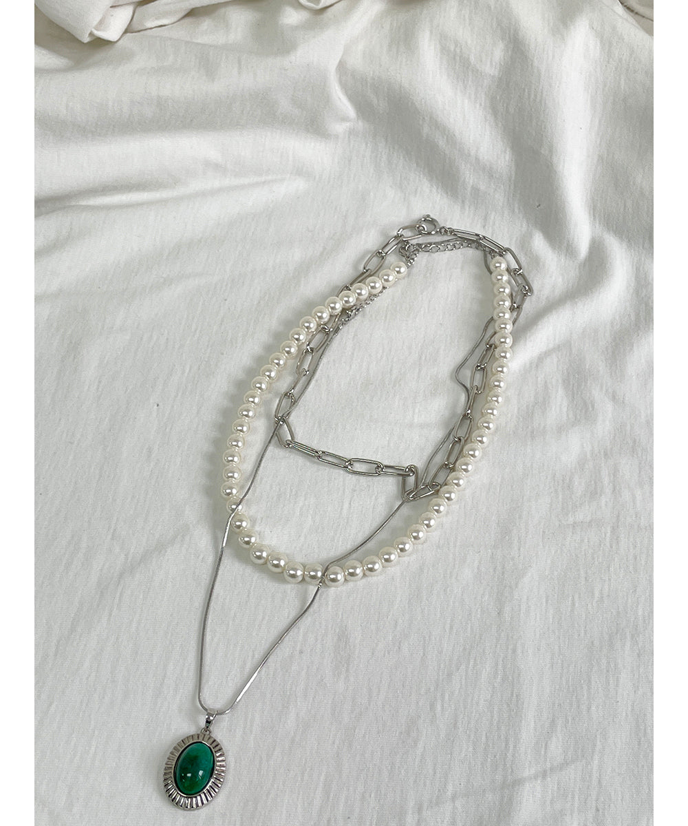 Elegant Multi-Strand Pearl and Chain Necklace with Green Pendant - Available in Gold and Silver